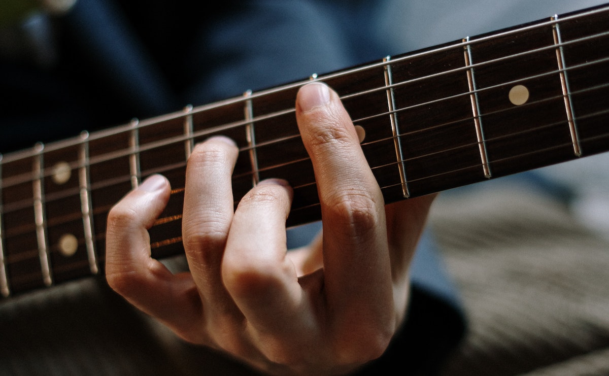 Playing guitar